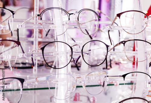 Optics store, set of glasses in shop windshield, medetsin.