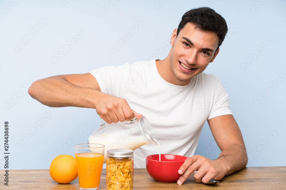 Handsome man in having breakfast Handsome man in having breakfast