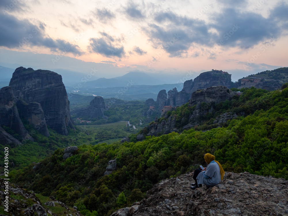 Photo of the panoramic view of the meteora valley at sunset