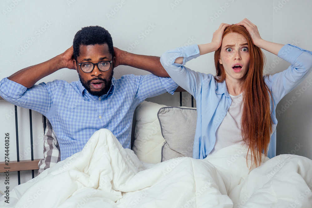 caucasian red-haired ginger beautiful surprise female and afro american  macho witg big size dick under blanket sheets in bedroom home  .international couple ethnic Stock Photo | Adobe Stock