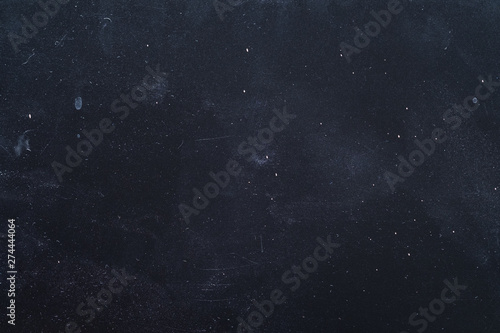 Dust and scratches design. Dark blue grunge abstract background. Distressed surface. Copy space.