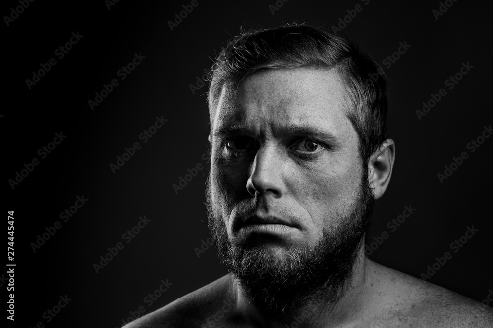 Portrait of a man with a beard on a black background Portrait of a man with a beard on a black background