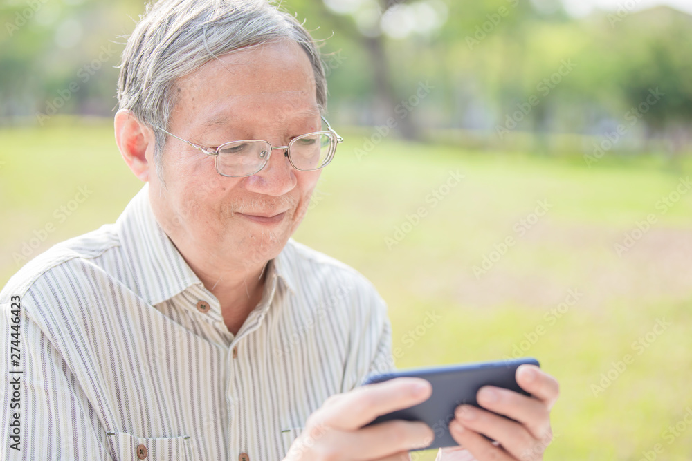 Older man watch video by cellphone Older man watch video by cellphone