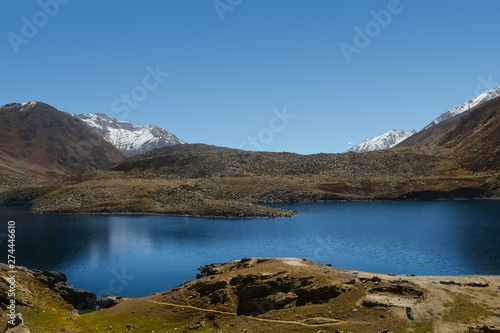 Nature landscape view of Lulusar Lake with snow capped mountain range in Kaghan Valley along Babusar road. A famous tourist attraction landmark in Khyber-Pakhtunkhwa, Pakistan.