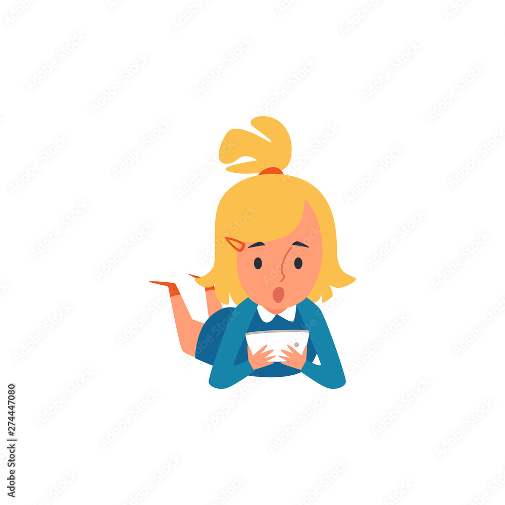 Little Caucasian blonde kid and child girl lying on the floor and playing at the tablet. Little Caucasian blonde kid and child girl lying on the floor and playing at the tablet.