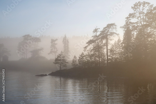 Foggy morning landscape on the lake, Valaam Island, Karelia, Russia.