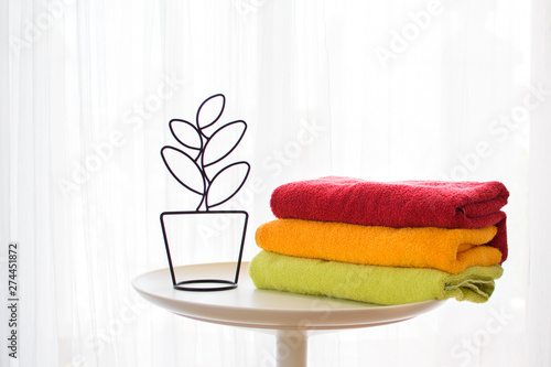 Bath towels of different colors.