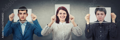 Принти на полотні Tree people covering their faces using photo sheets with happy, sad and neutral emotions, like mask to hide real expression from society