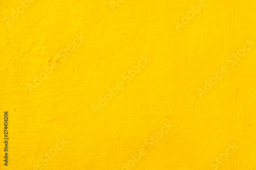 Modern bright with yellow distress concrete of architecture building structure for background with vintage tone.