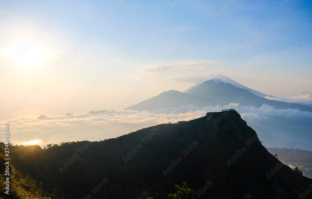 Sunrise at Mount Batur, Bali. Mountain hiking at sunrise