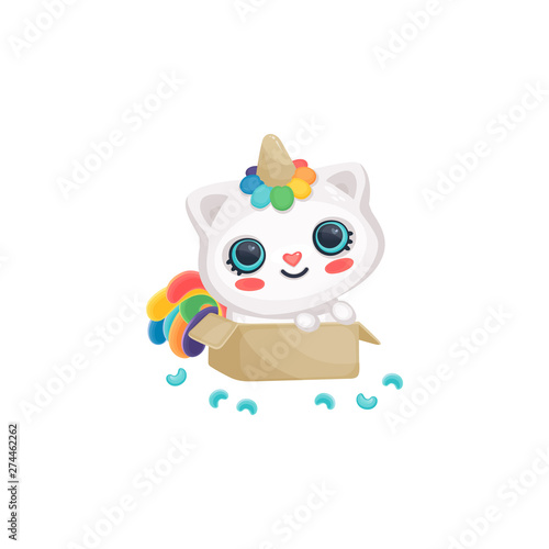 A funny baby caticorn  cat and a unicorn on a box with a rainbow and smile.