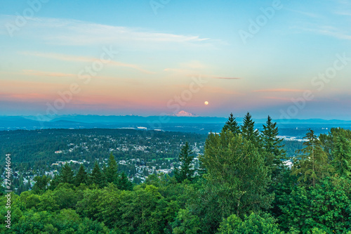 Stunning sunset over distant Mount Baker  highlighted by Full Moon rising - from UniverCity at Burnaby Mountain  Summer