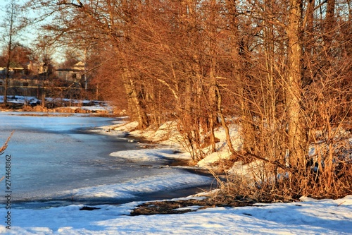 Spring on a frozen lake on a Sunny day. Russia. Semenov