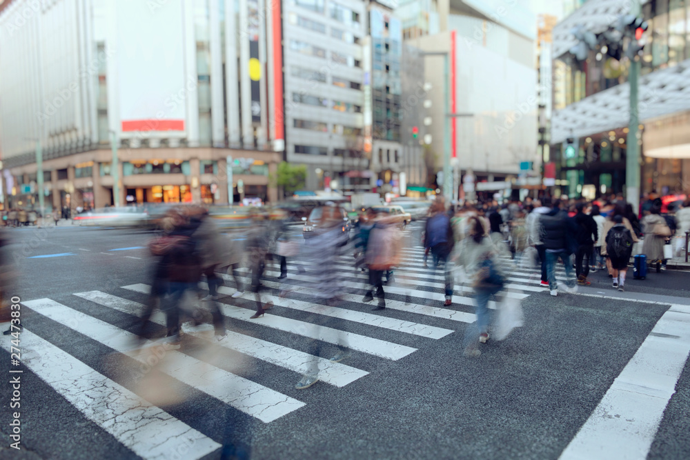 People walking in pedestrian crossing in Osaka