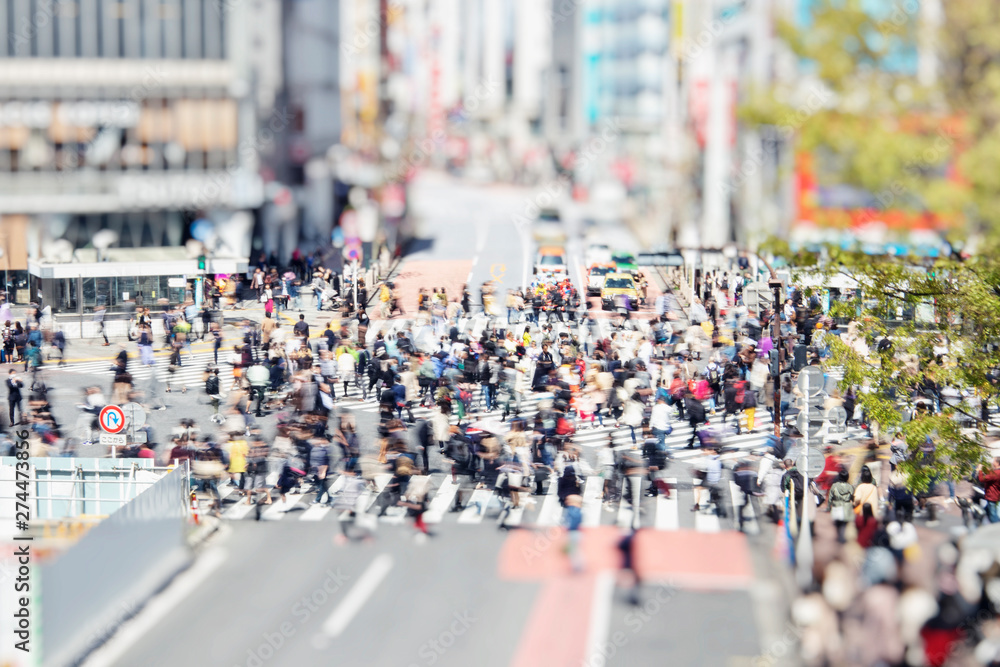 Shibuya crosswalk in Tokyo, Japan, with Walking people