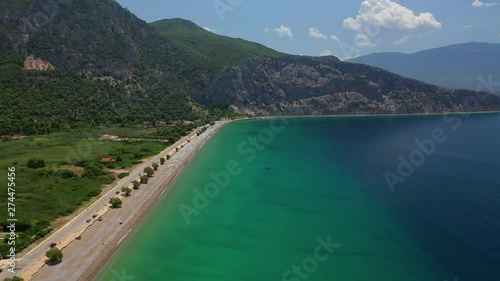 Aerial video of famous sandy beach of Psatha in West Attica with emerald clear sea, Corinthian gulf, Greece photo