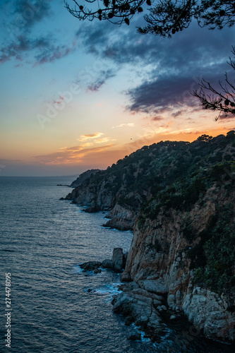 Rocky coastline during sunset