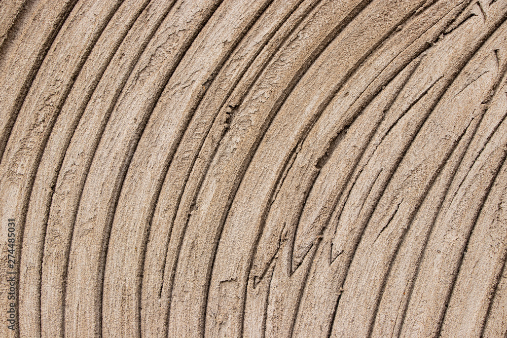 Fototapeta premium Curved concrete plaster lines texture