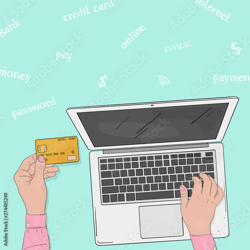 Female hands with credit card and laptop. Copy space.