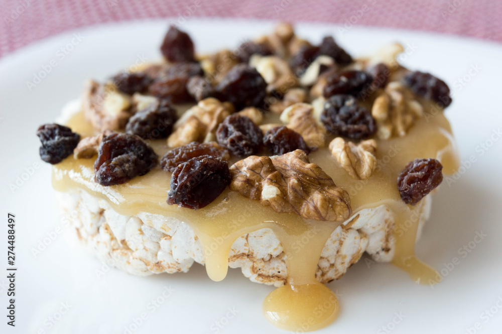 Rice biscuit with honey, nuts and raisins without seeds. Rice biscuit with honey, nuts and raisins without seeds.