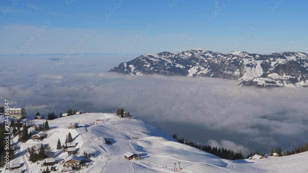 Pan from high-altitude mountain summit over valley with cloud inversion (Klewenalp-Vierwaldstättersee Switzerland) Pan from high-altitude mountain summit over valley with cloud inversion (Klewenalp-Vierwaldstättersee Switzerland)