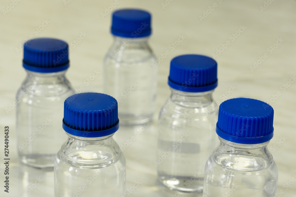 chemical glassware for storing chemicals and solution. spheres of application - medicine, chemistry, health care, water supply, science. Laboratory chemical glassware for storing chemicals and solution. spheres of application - medicine, chemistry, health care, water supply, science. Laboratory
