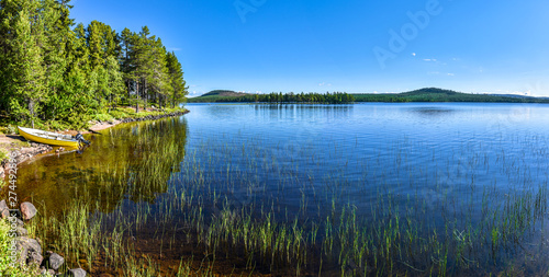 Fototapeta Naklejka Na Ścianę i Meble -  Panoramic view at Siebdniesjavrrie lake in Swedish Lapland. Vasterbotten county, Norrland, Sweden.
