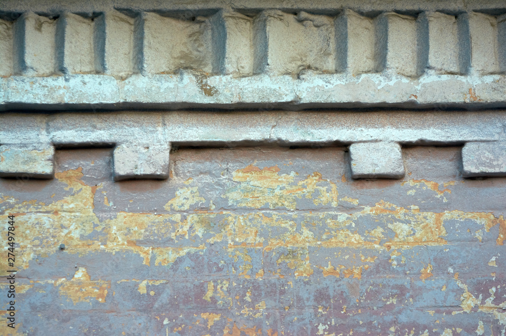 Naklejka premium Decorative brick element of the facade wall of the building of the nineteenth century