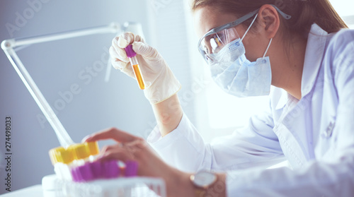 Obraz na plátne Researcher, doctor, scientist or laboratory assistant working with plastic medic