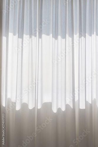 Curled white curtain