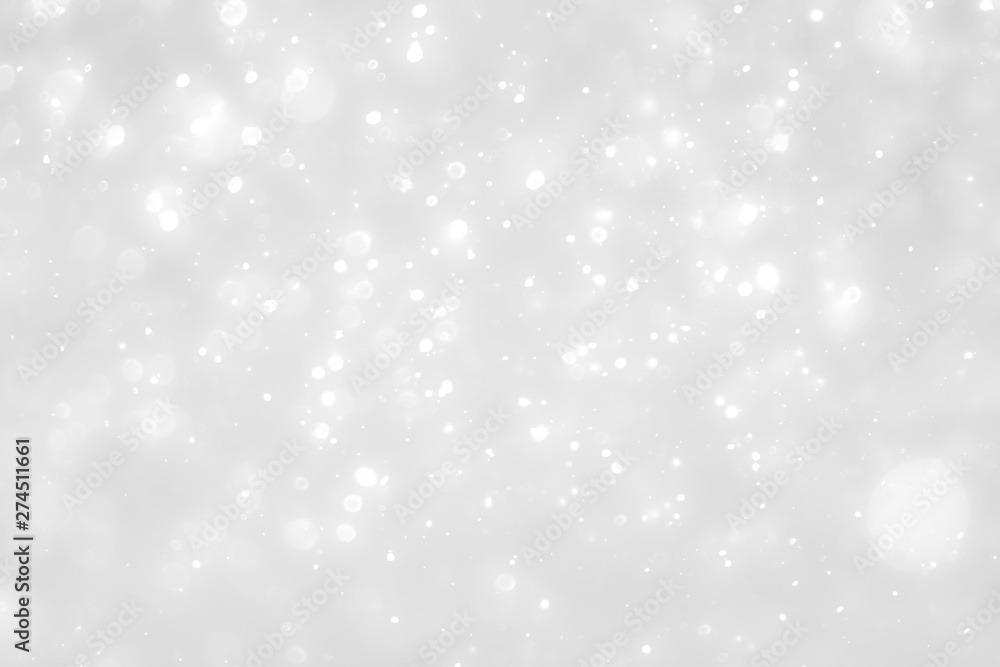 White and Silver lights on bokeh abstract background.