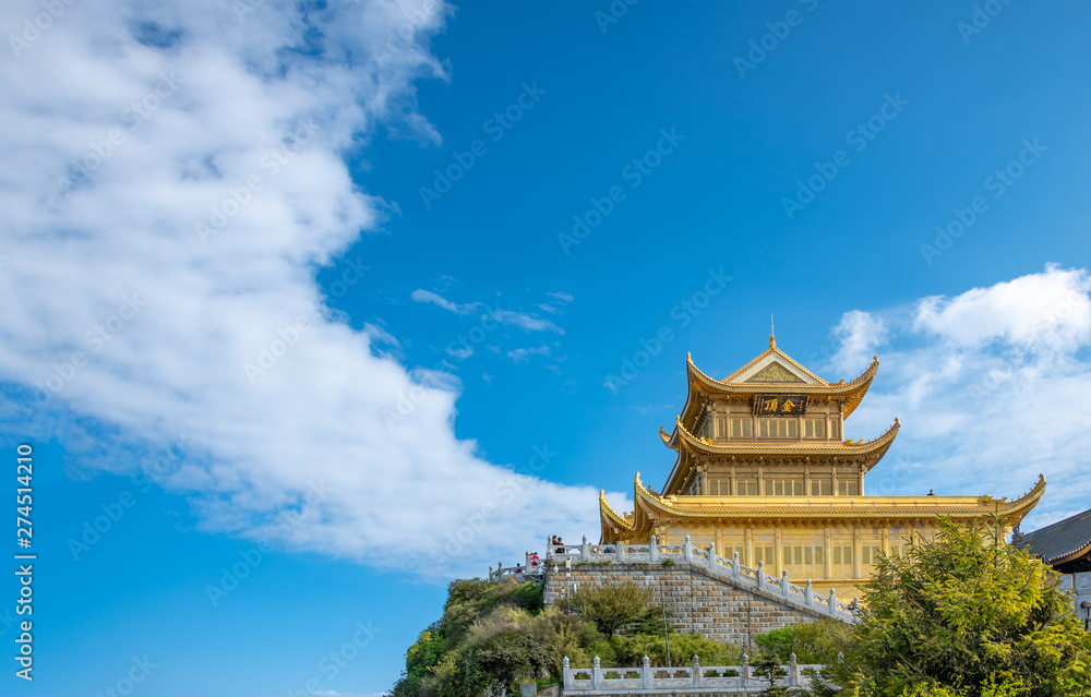 A gold-roofed temple building in mount emei, sichuan province, China A gold-roofed temple building in mount emei, sichuan province, China