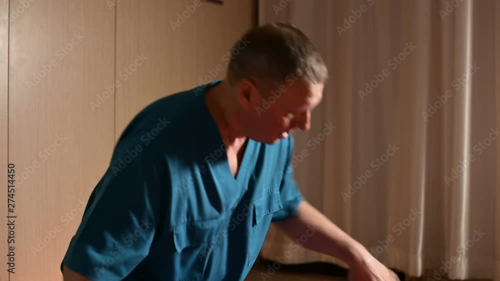 A male physiotherapist makes a wellness manual procedure for a young girl patient. Osteopathy and non-traditional medicine. Massage of foot calves A male physiotherapist makes a wellness manual procedure for a young girl patient. Osteopathy and non-traditional medicine. Massage of foot calves