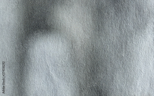 Macro of grey halftone gradient dots on newsprint