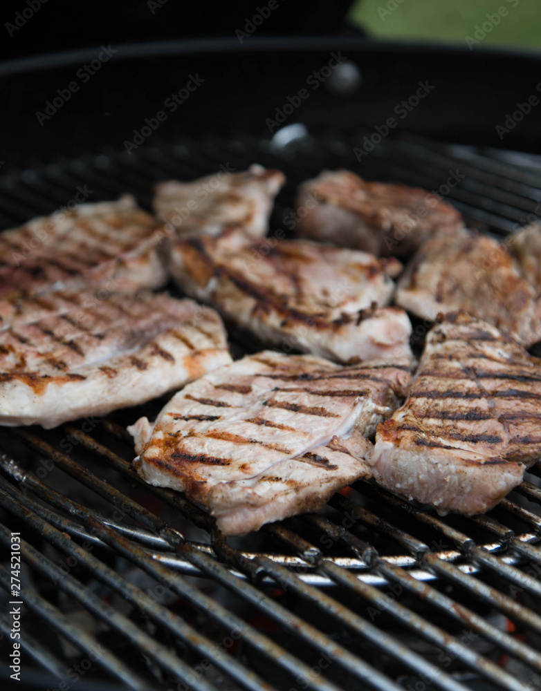 grilled meat steak, marinated pieces of meat are grilled on the grill. Barbecue grilled meat steak, marinated pieces of meat are grilled on the grill. Barbecue