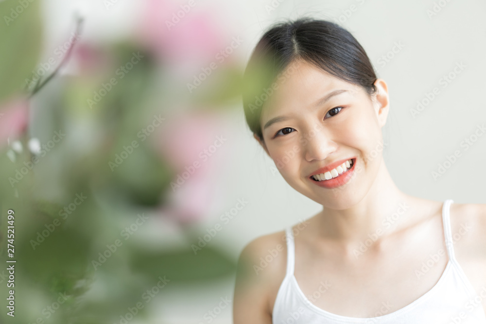 portrait young asian woman . The girl smiled at the camera.