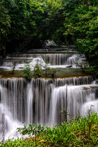 Fototapeta Naklejka Na Ścianę i Meble -  Huai Mae Kamin Waterfall in the rainy season at the tropical forest of Kanchanaburi National Park, Thailand