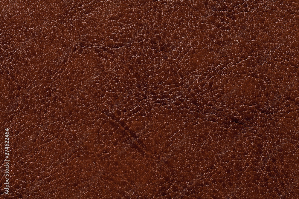 Dark brown leather texture background, closeup. Bronze cracked backdrop from wrinkle skin Dark brown leather texture background, closeup. Bronze cracked backdrop from wrinkle skin