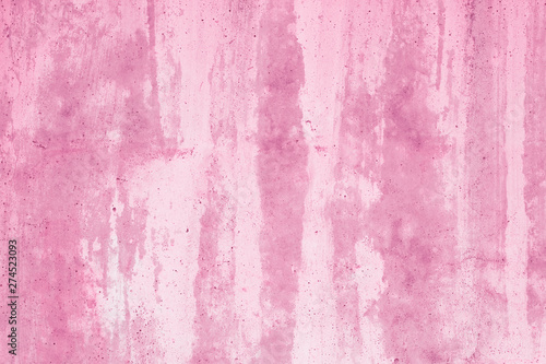 Abstract soft pink background. Purple blots on a pink canvas. Painted paper texture. Red paint stains on the wall. Pattern of watercolor style on illustration. Light rosy gradient of aquarelle surface