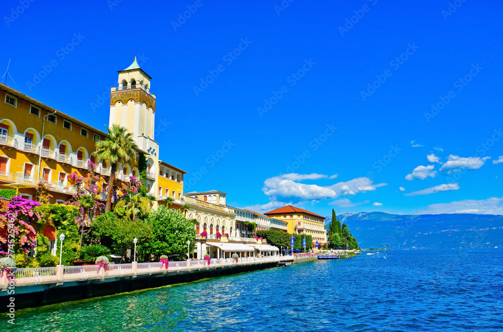  View of Gardone Riviera at the lakeside of Lake Garda in summer.