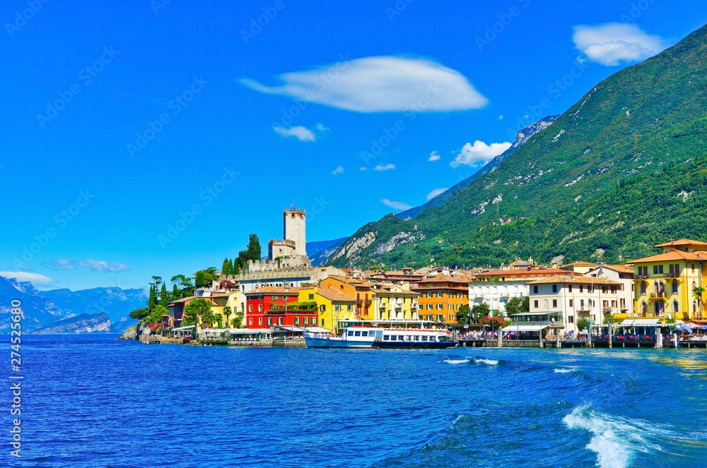 Malcesine at the lakeside of Lake Garda in summer. Lake Garda is a popular holiday location and the largest lake in Italy.