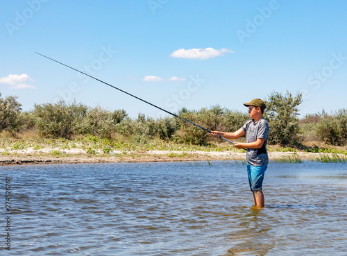 A Boy Fishing in the Danube