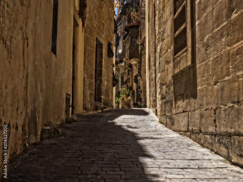 Narrow Street in Rabat, Malta Narrow Street in Rabat, Malta