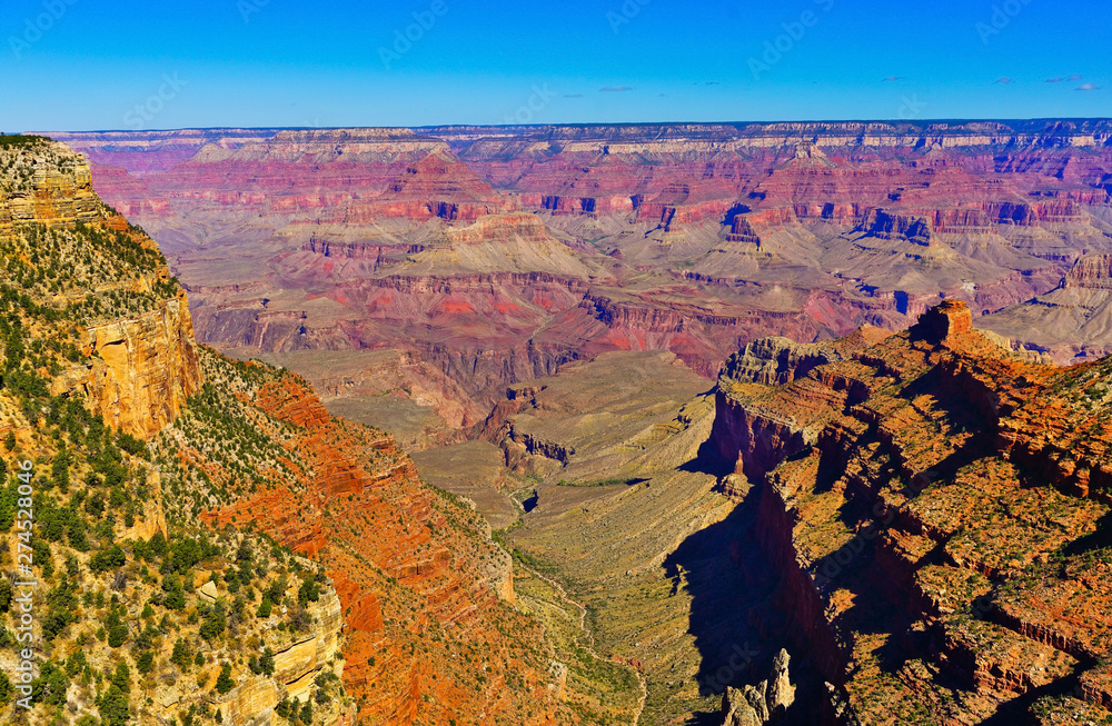 The beautiful view of Grand Canyon from the south rim of Grand Canyon National Park on a sunny day. 