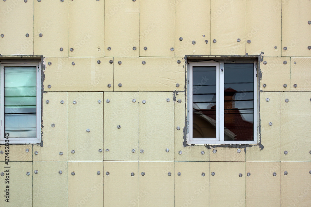 New building facade with Installing external insulation Stock Photo ...