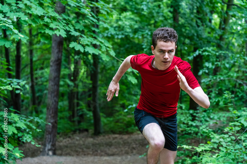 Healthy lifestyle - young man running © Jacek Chabraszewski