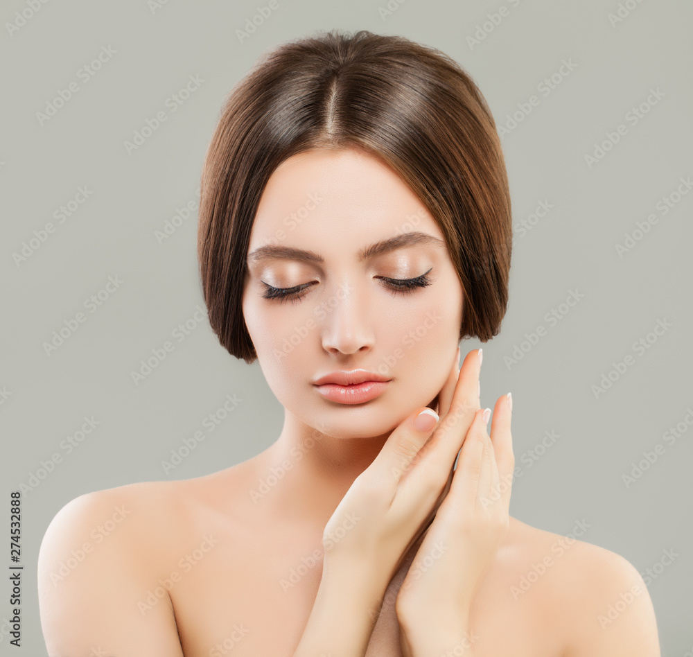 Perfect young woman with clear skin portrait. Skincare and facial treatment concept Perfect young woman with clear skin portrait. Skincare and facial treatment concept
