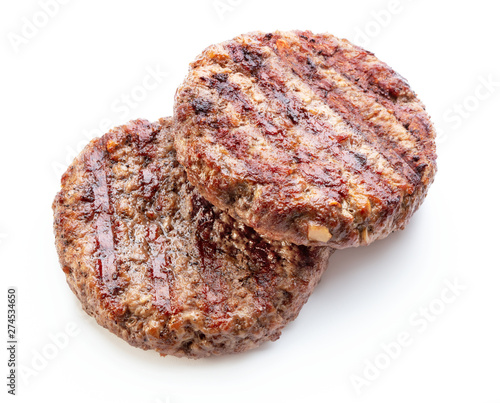 two grilled meat cutlet made of minced beef meat isolated on white background