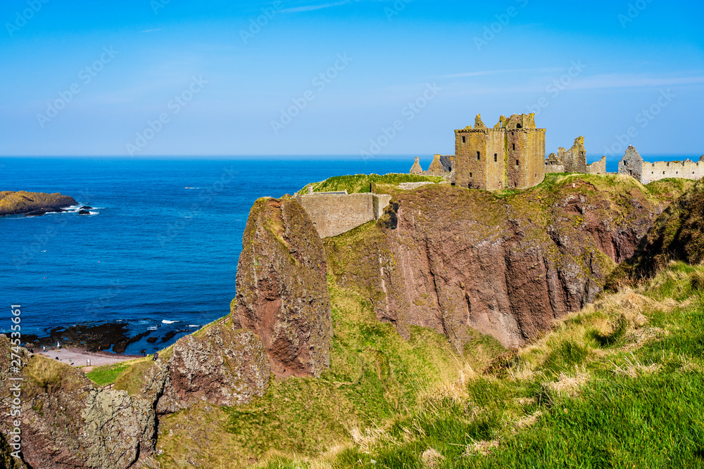 Dunnottar Castle with blue sky in - Stonehaven, Aberdeen, Scotland UK