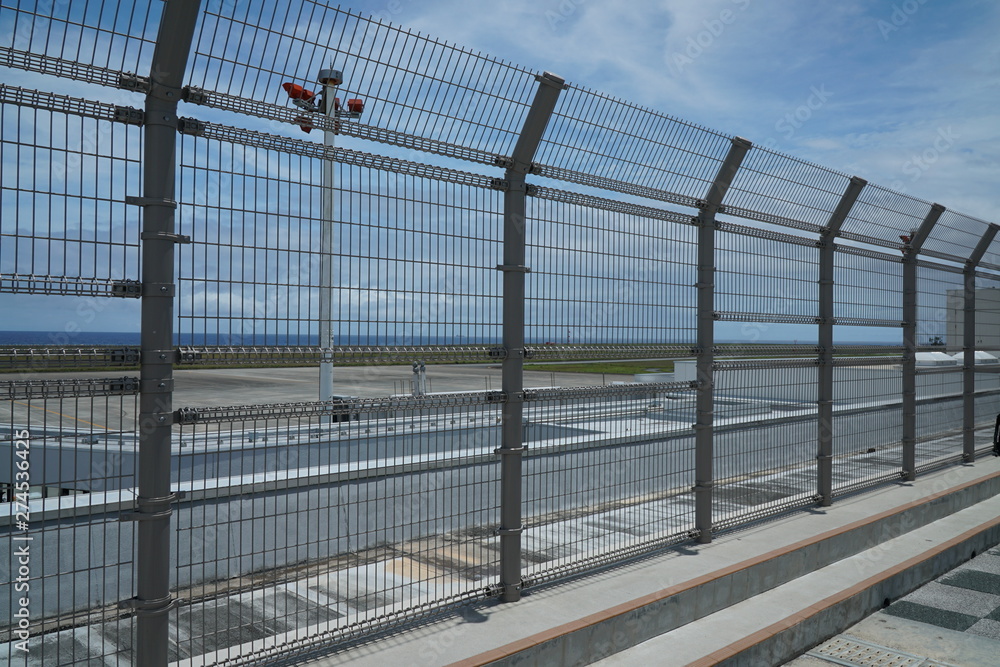 Amami Oshima, Japan - June 20, 2019: Amami airport terminal building observation deck in Amami Oshima, Kagoshima, Japan Amami Oshima, Japan - June 20, 2019: Amami airport terminal building observation deck in Amami Oshima, Kagoshima, Japan